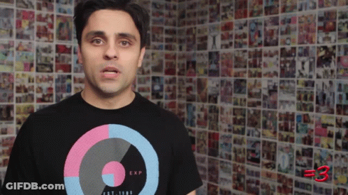 Man In Black T-Shirt Saying EXP GIF