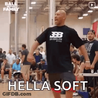 Man In Black T-Shirt Standing On Basketball Court With Arms Outstretched GIF
