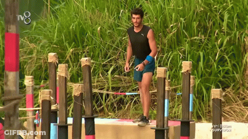 Man In Black Tank Top And Blue Shorts GIF