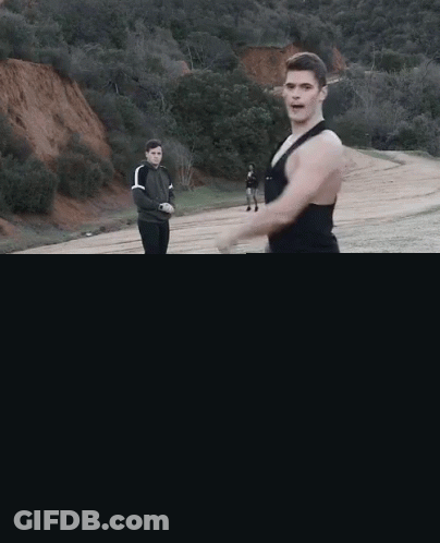 Man In Black Tank Top And Camo Pants GIF