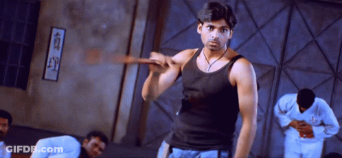 Man In Black Tank Top And Chinese Writing Wall GIF