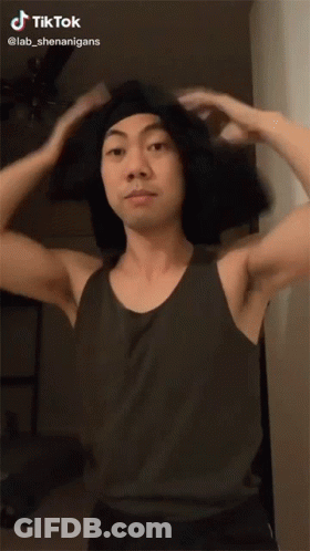 Man In Black Tank Top And Headband With TikTok Sticker GIF