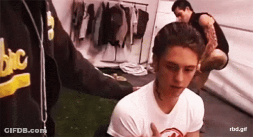 Man In Black Tank Top And Suspenders Holding Guitar GIF