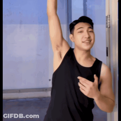 Man In Black Tank Top Arm Raised GIF