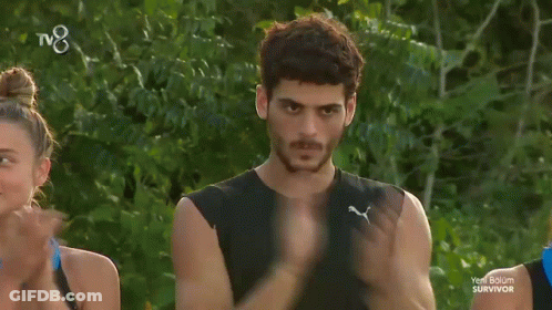 Man In Black Tank Top Clapping GIF