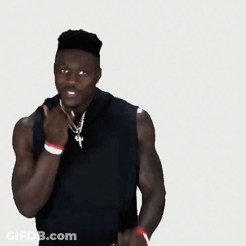 Man In Black Tank Top Covering Nose GIF
