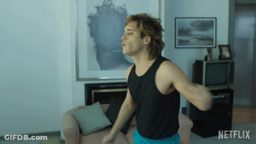 Man In Black Tank Top Dancing With Netflix Logo GIF