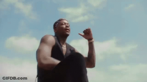 Man In Black Tank Top Fist Pump GIF