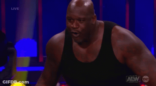 Man In Black Tank Top In Wrestling Ring GIF