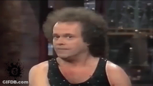 Man In Black Tank Top Making Funny Face GIF