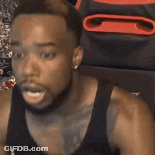 Man In Black Tank Top Making Funny Face GIF