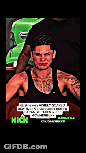 Man In Black Tank Top Making Strange Face GIF