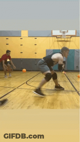 Man In Black Tank Top Playing Basketball GIF