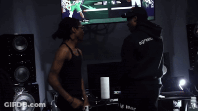 Man In Black Tank Top Saying S.com GIF