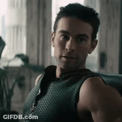 Man In Black Tank Top Sitting GIF