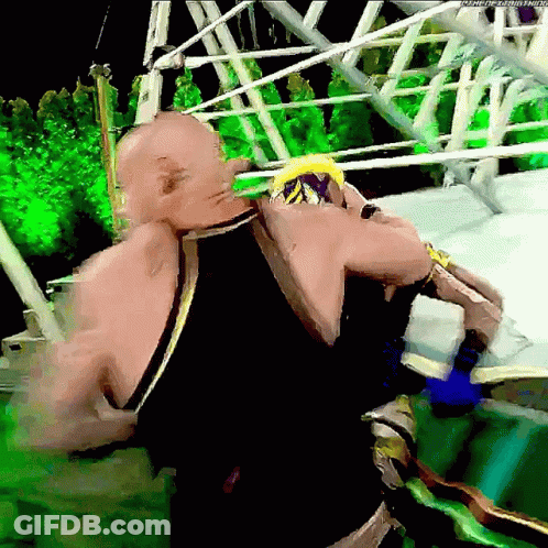 Man In Black Tank Top Standing In Ring GIF