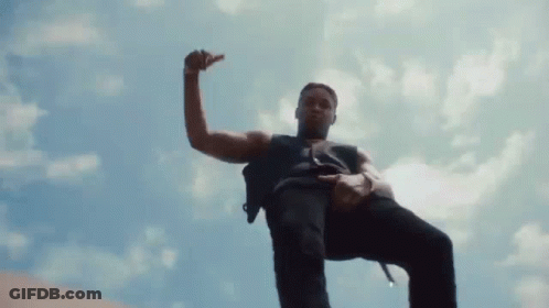 Man In Black Tank Top Standing GIF
