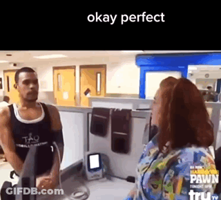 Man In Black Tank Top Talking To Woman GIF