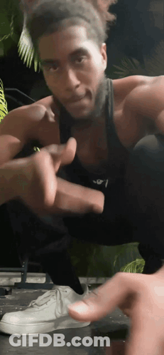 Man In Black Tank Top With A GIF