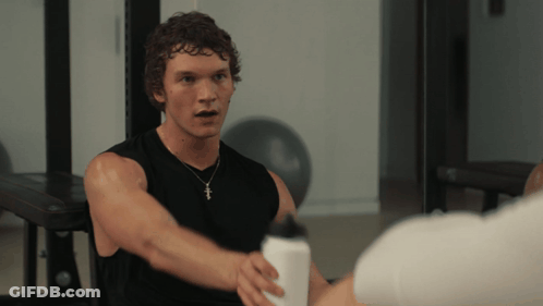 Man In Black Tank Top With Cross Necklace GIF