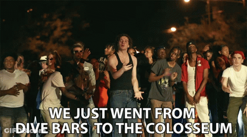 Man In Black Tank Top With Crowd GIF