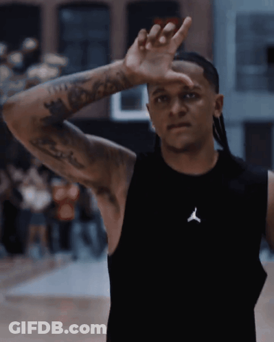 Man In Black Tank Top With Jordan Logo GIF