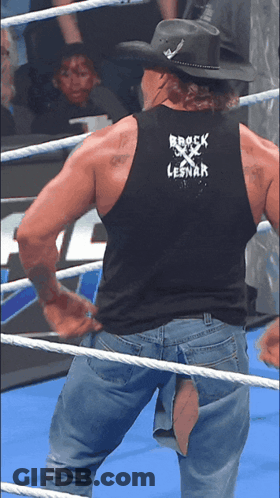 Man In Black Tank Top With Rock Lesnar GIF
