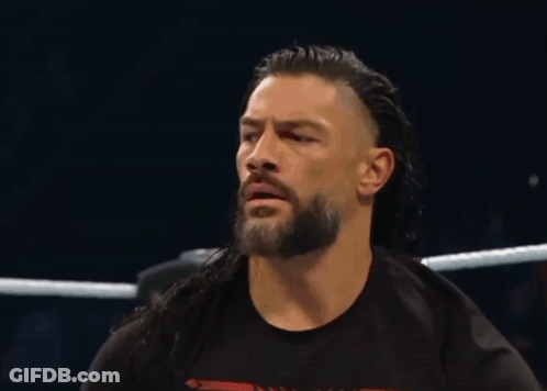 Man In Black Tank Top With Tattoo In Wrestling Ring GIF