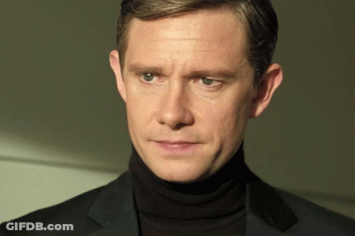 Man In Black Turtleneck And Suit GIF