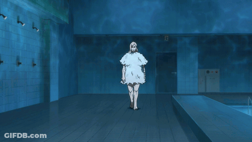 Man In Black Turtleneck And Woman In White Dress In Dark Room GIF