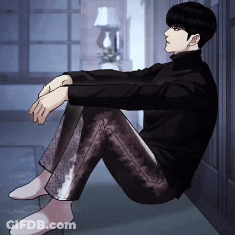 Man In Black Turtleneck Sitting Cross-Legged GIF