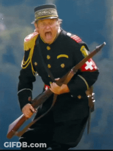 Man In Black Uniform Holding Gun GIF