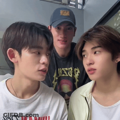 Man In Black USG Shirt Looking At Camera GIF