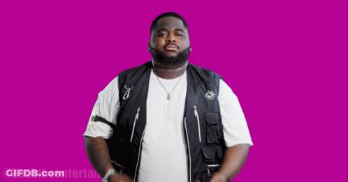 Man In Black Vest And White Shirt On Purple Background GIF