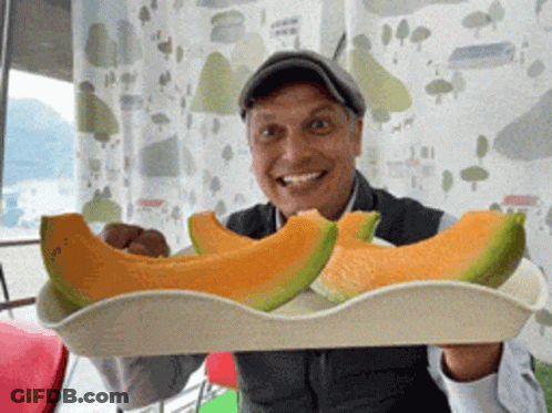 Man In Black Vest Saying Is This Puffy Enough GIF