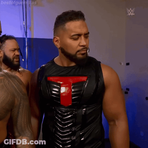 Man In Black Vest With Red T GIF