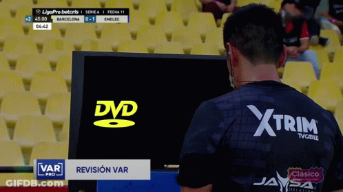 Man In Black Xtrim Shirt Watching DVD GIF