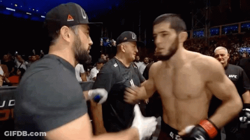 Man In Blonde Wig Holding Microphone Says I Am Gonna Smash Your Boy Guys GIF