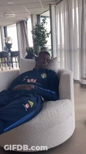 Man In Blue Adidas Jacket Sleeping In Chair GIF