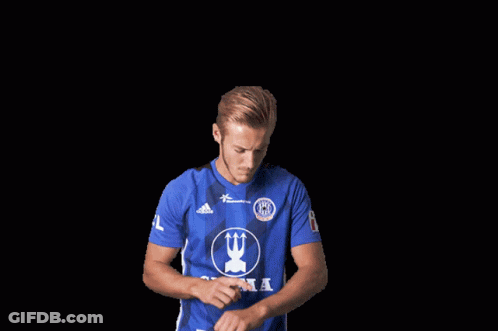 Man In Blue Adidas Shirt Hands On Hips GIF