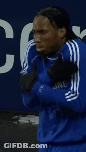 Man In Blue Adidas Shirt In Front Of Number 3 GIF