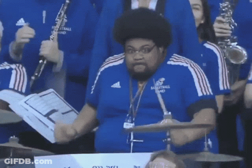Man In Blue Adidas Shirt Playing Drums GIF