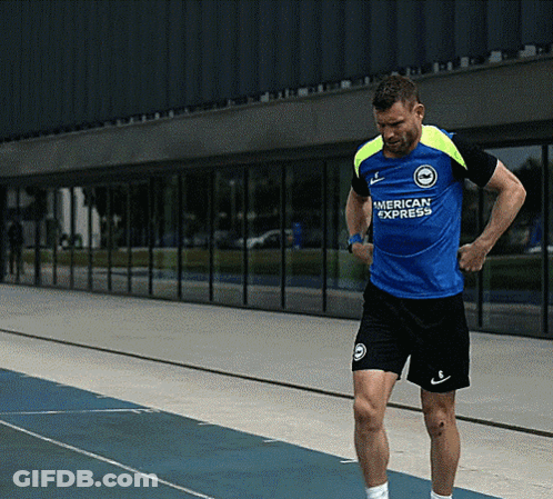 Man In Blue American Express Shirt On Track GIF
