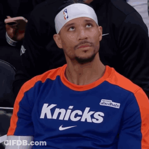 Man In Blue And Orange Knicks Shirt GIF