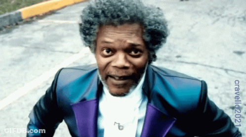 Man In Blue And Purple Suit With 2021 GIF