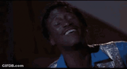 Man In Blue And Silver Suit Laughing GIF