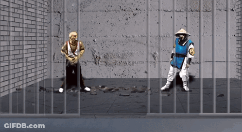 Man In Blue And White Behind Bars GIF