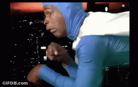 Man In Blue And White Costume Pointing GIF