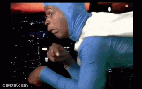 Man In Blue And White Costume Pointing GIF