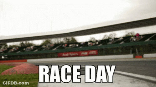 Man In Blue And White Porsche Racing Suit GIF